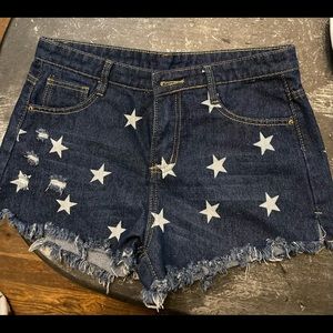 Junior’s size Medium denim cutoff shorts with white stars! Super cute!